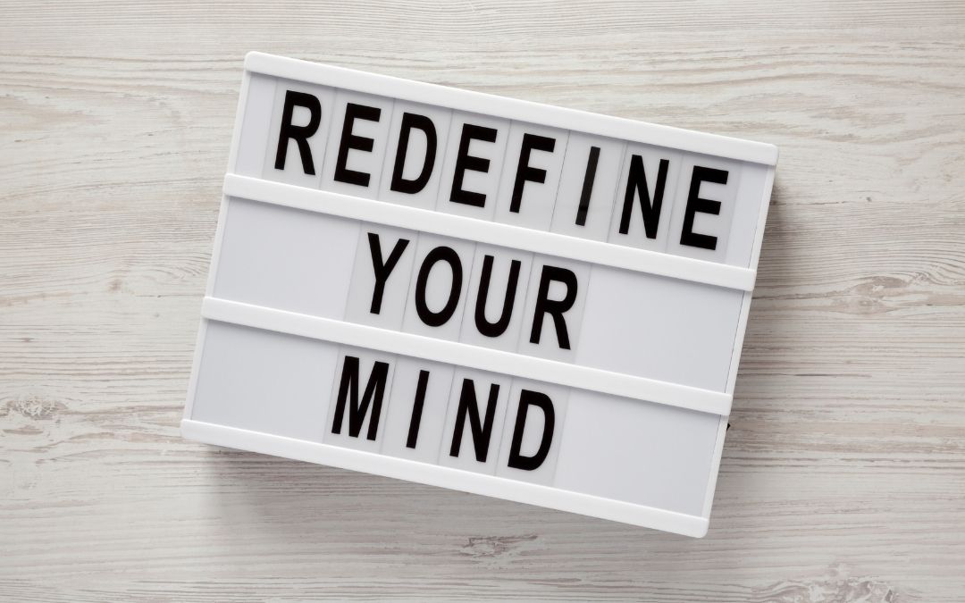 Picture that says redefine your mind as one step towards personal growth