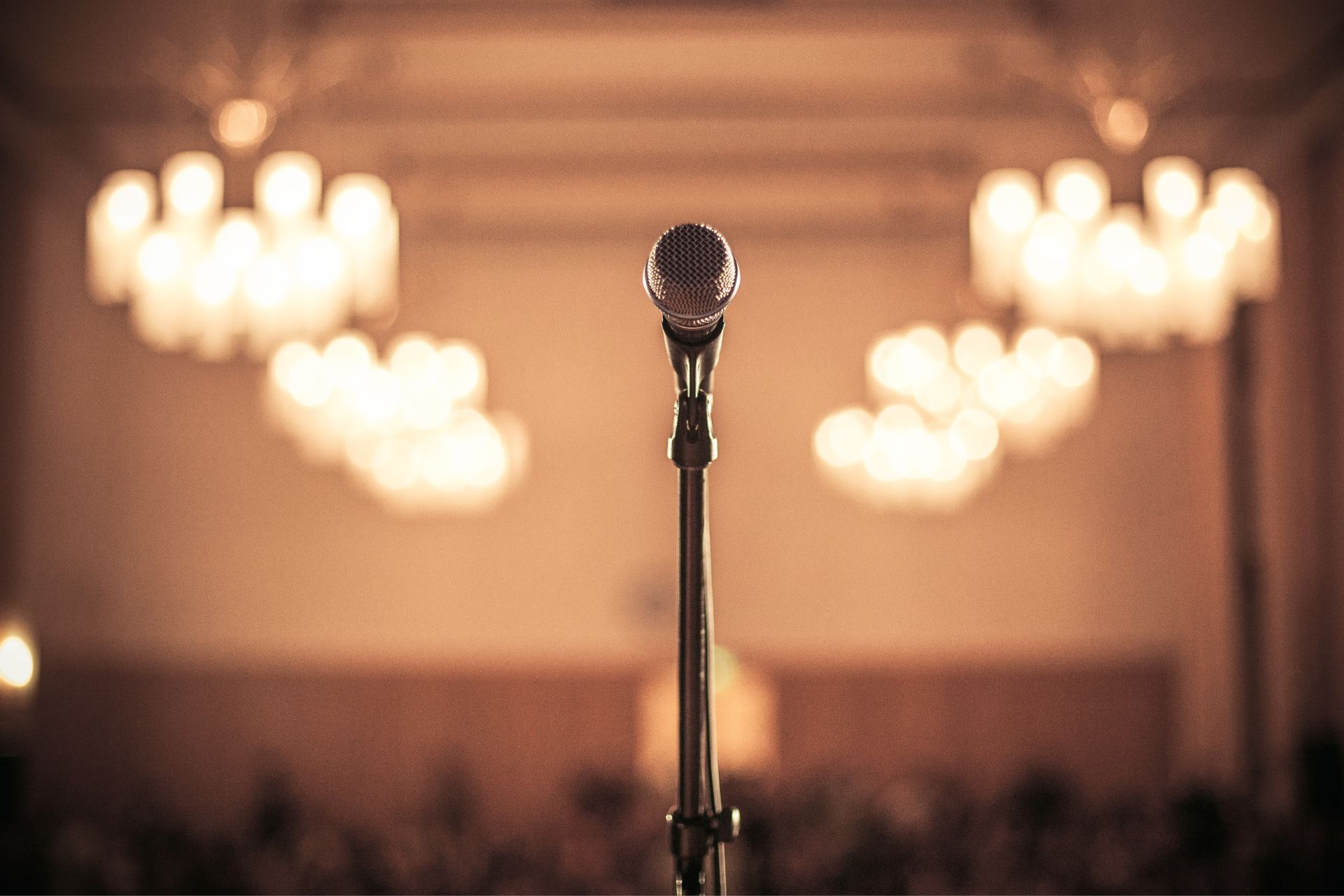 corporate-speaking-1 microphone and stage for corporate speaking