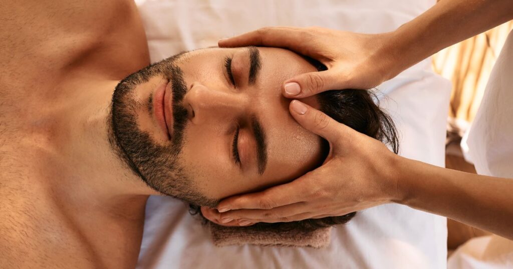 Man getting a massage as part of self-care