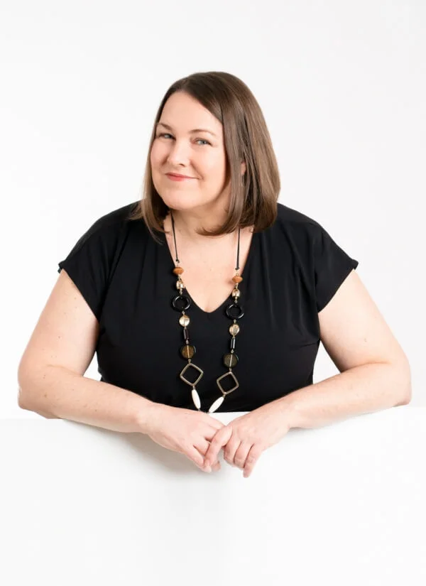 Sonya Stattmann, founder mental health coach and advocate, white studio setting